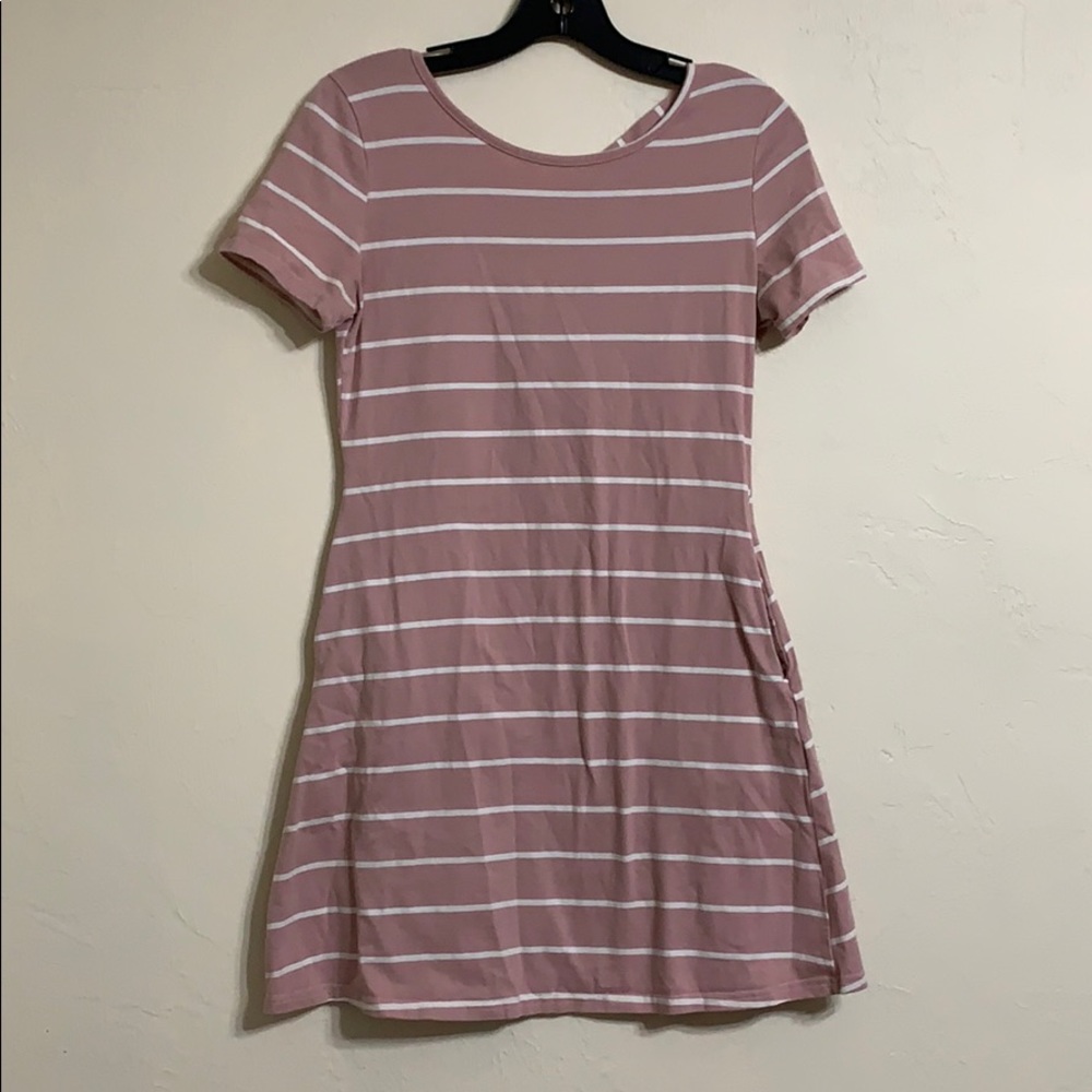 A light pink dress with white stripes.